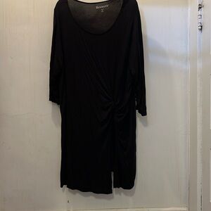 Knit tunic with cinched side, which leads to a split